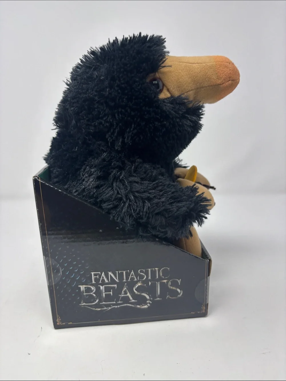 Warner Bros. Fantastic Beasts Niffler Plush - Black and Tan with Gold Coin